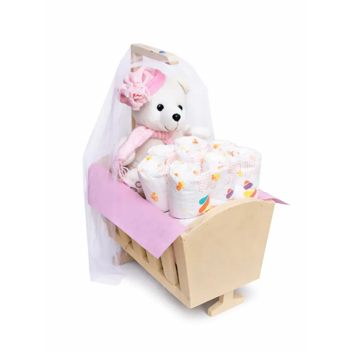 Regalo de nacimiento para niña con pañales y peluche en cuna decorativa rosada entrega a domicilio en Lima